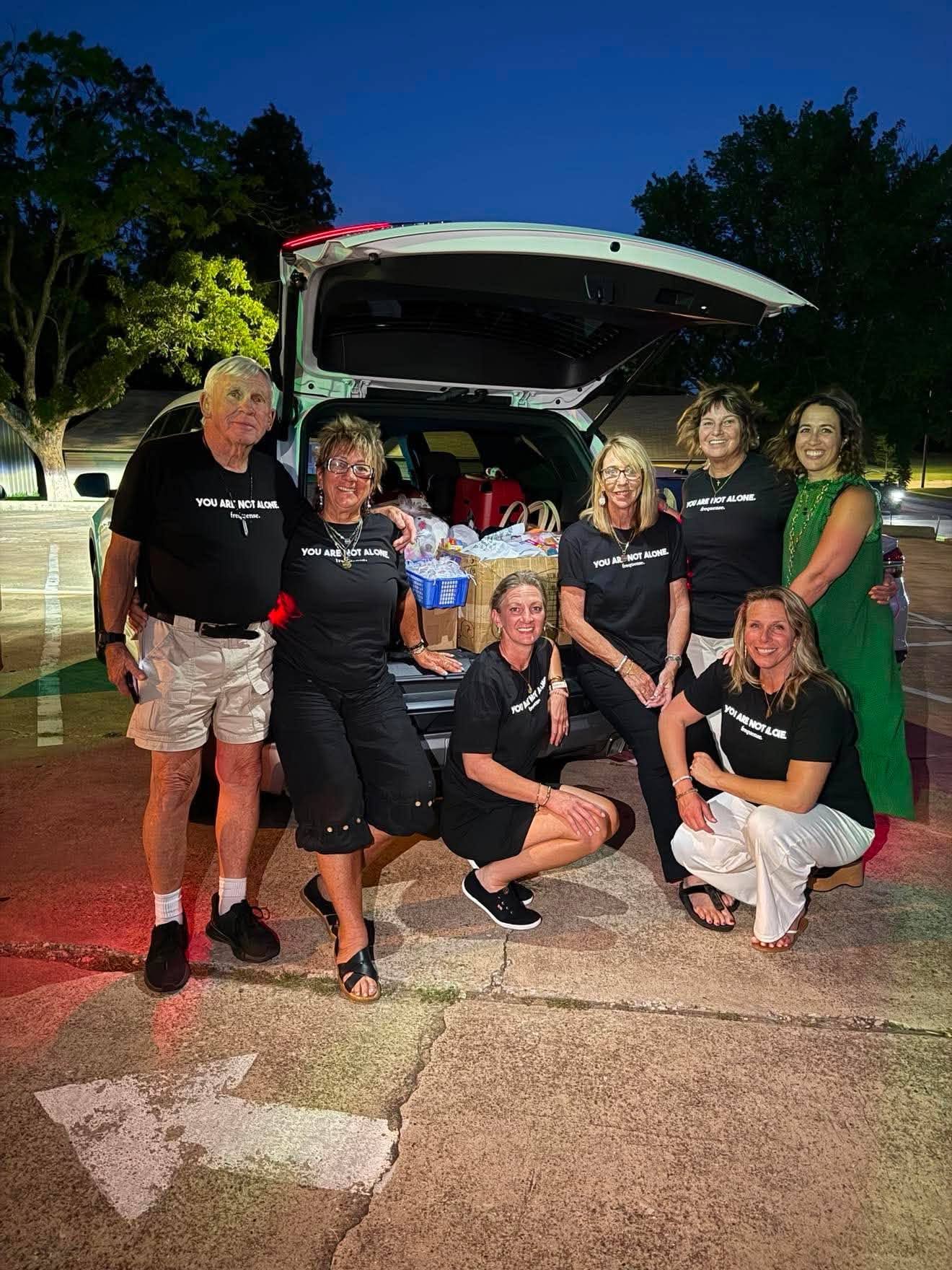 Frequense Platinum leaders delivering supplies to a local homeless shelter