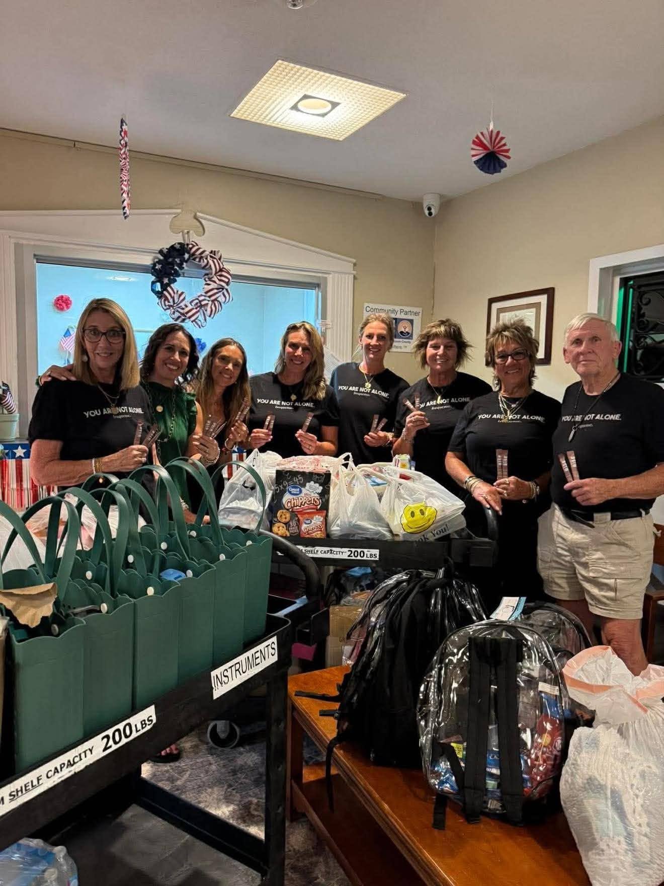 Platinum leaders dropping off donations at the shelter